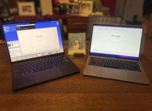 New M3 Pro MacBook Pro on the left and older Intel MacBook Air on the right.